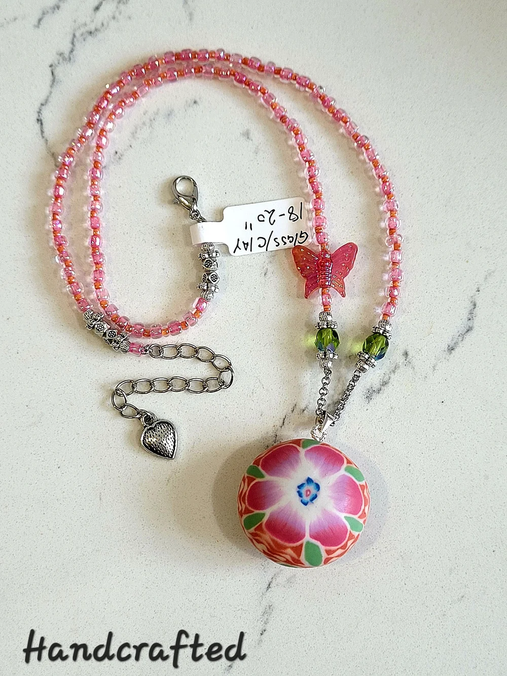 Hand Crafted Pink Beaded Necklace with Butterfly Charm and Floral Pendant - Picture 3 of 4